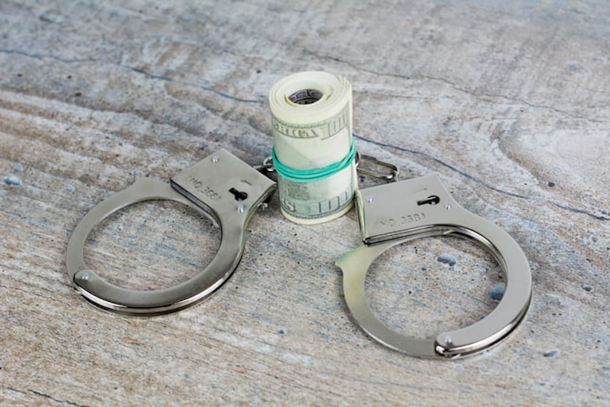 handcuffs-cash.jpg.jpg