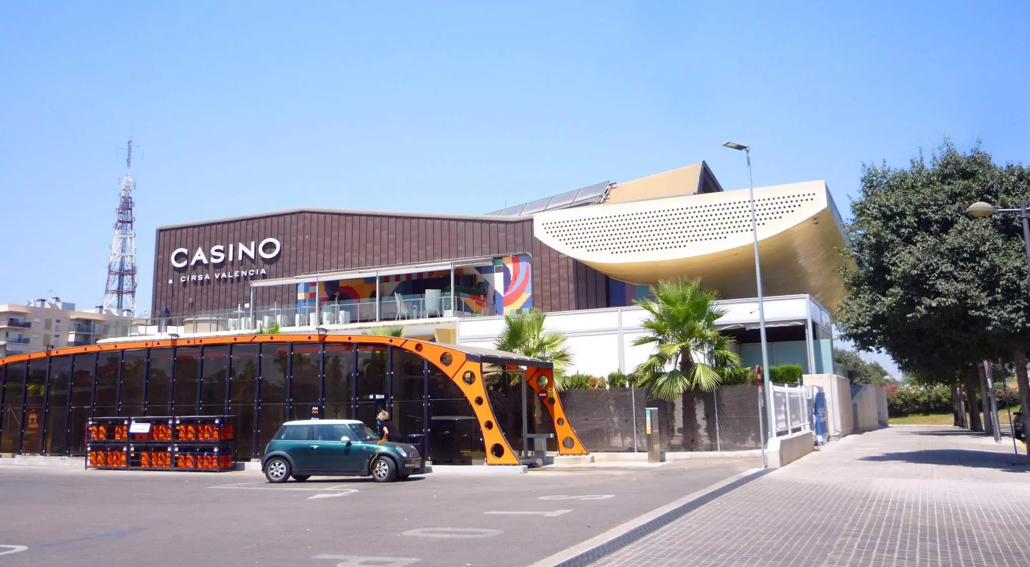 Exterior view of the Casino Cirsa Valencia building under a clear blue sky.